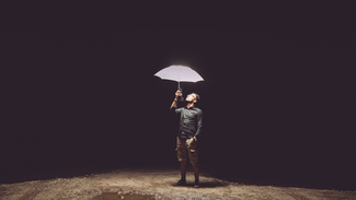 man under umbrella
